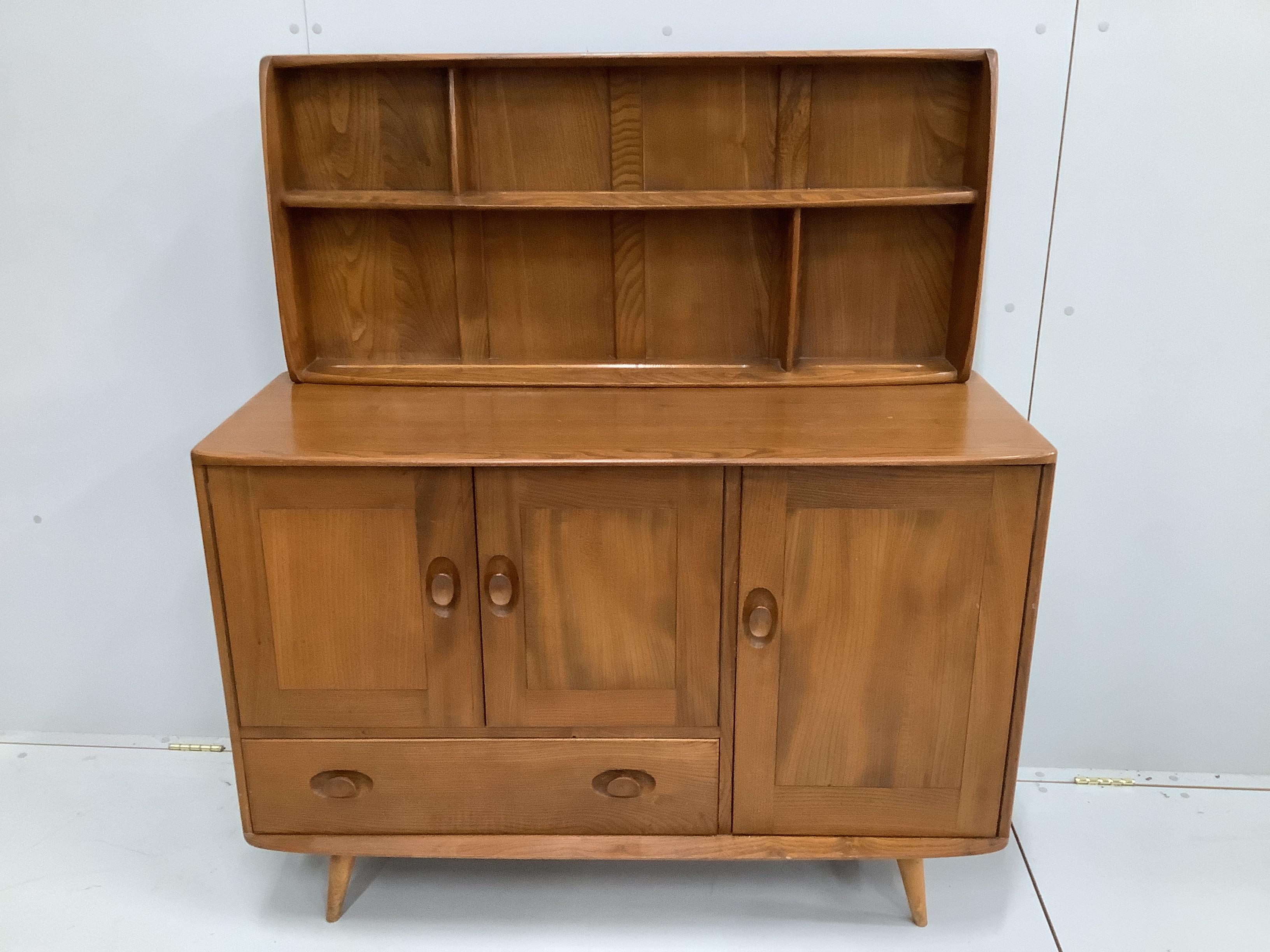An Ercol Windsor elm sideboard with plate rack, width 114cm, depth 44cm, height including rack 130cm